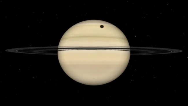 Titan Darkens Saturn in Rare Shadow Transit on August 19